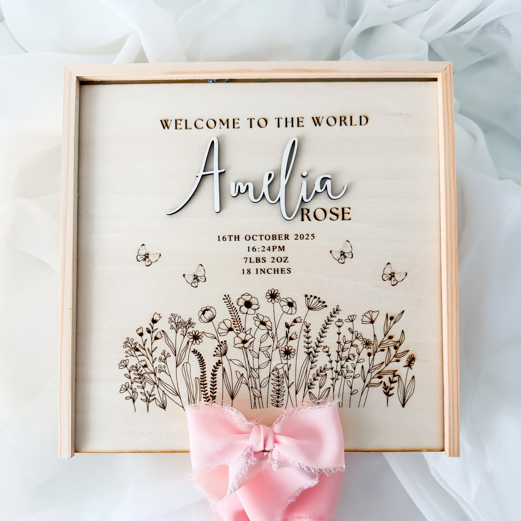 Wildflower baby keepsake box lid engraved Welcome to the World with the name Amelia Rose, birth stats and butterflies