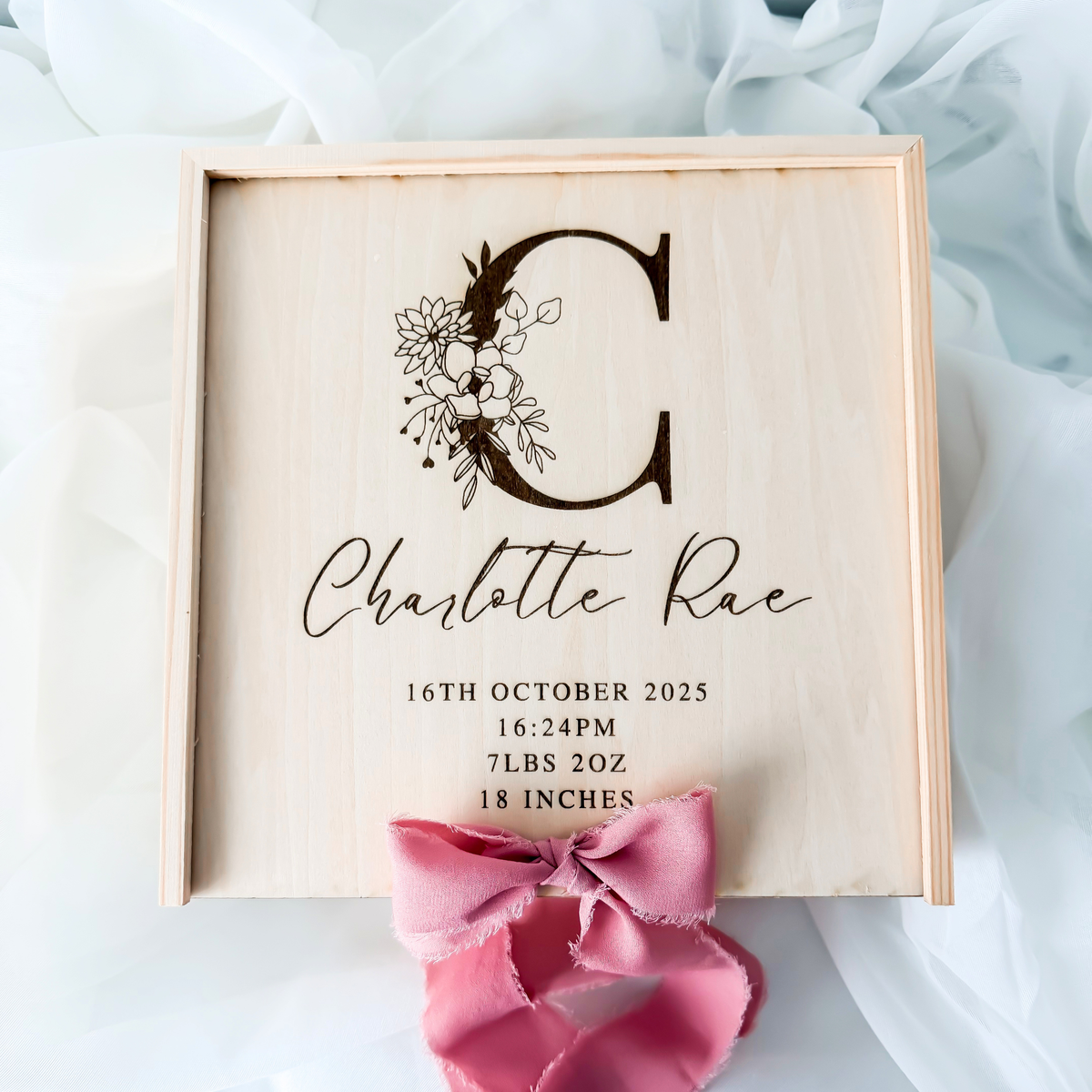 Personalized keepsake box lid engraved with a floral C, the name and birth details